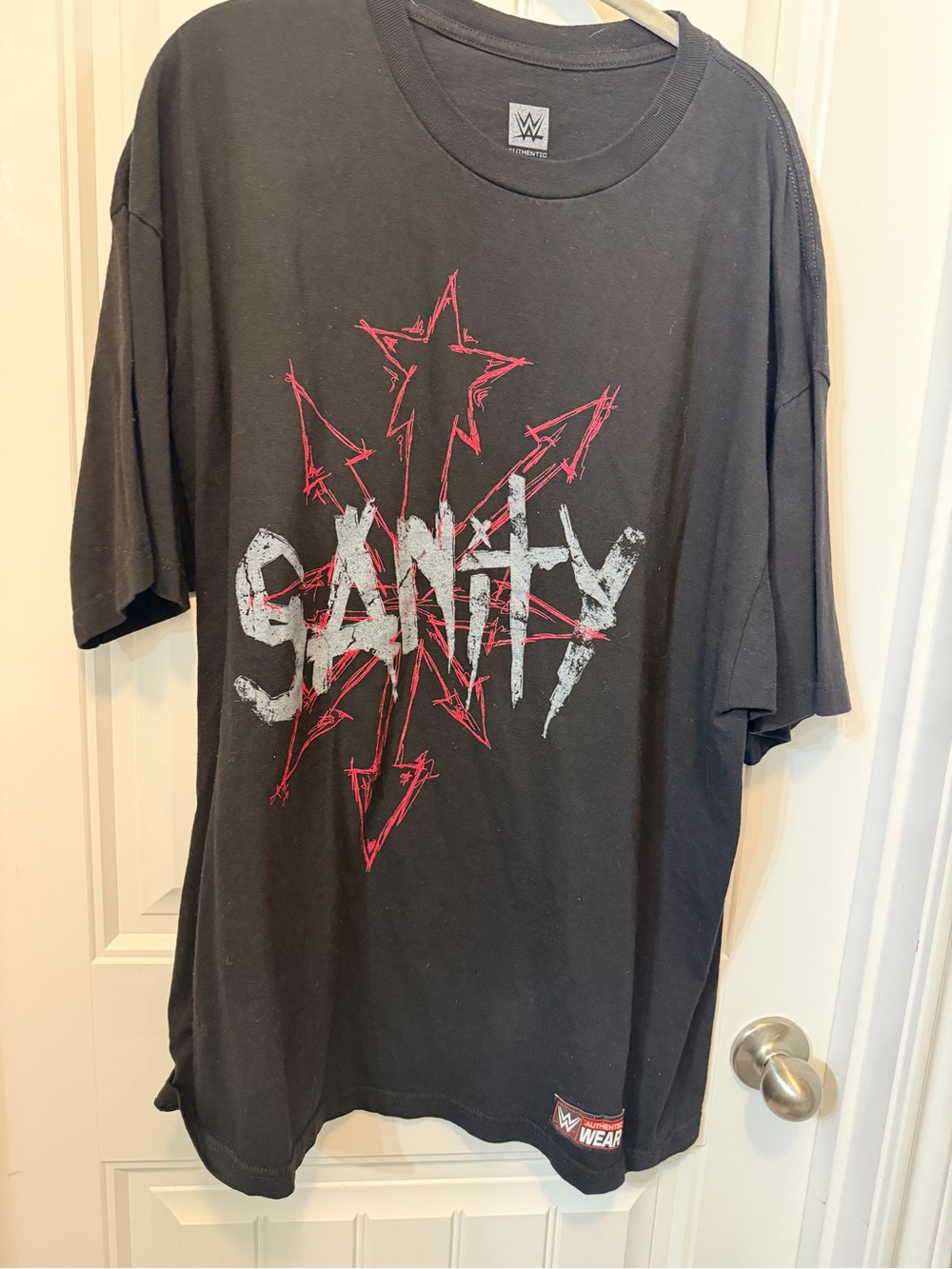 WWE Black Sanity Graphic Tee with Red & White Print
